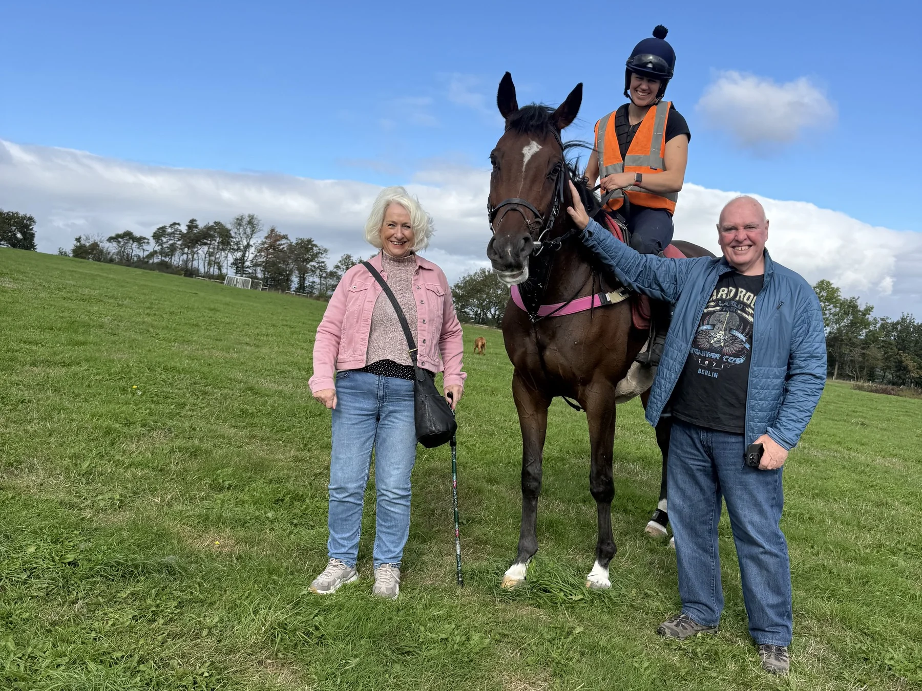 Racehorse owners together at the racecourse